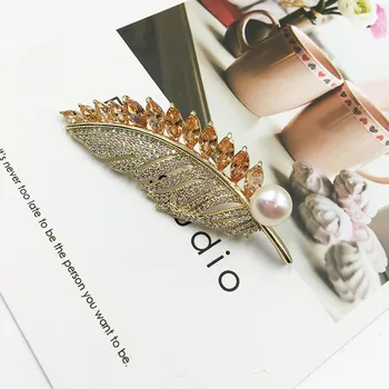 Ustvarjalne Luksuzni Cirkon Veliko Perja Nosorogovo Broška Pin Elegantno Kristalno Pearl Broške za Ženske Zimski Plašč Corsage Nakit