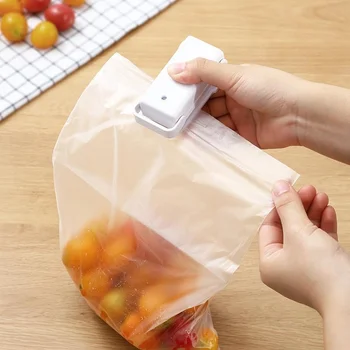2pcs Prenosni Mini Fotke Doma Toplote Vreča Plastičnih Food Prigrizke Zapiranje Stroj za Pakiranje Živil v Kuhinji Vrečko za Shranjevanje Posnetkov na Debelo